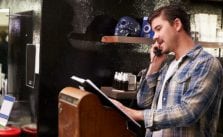 small businessman at phone