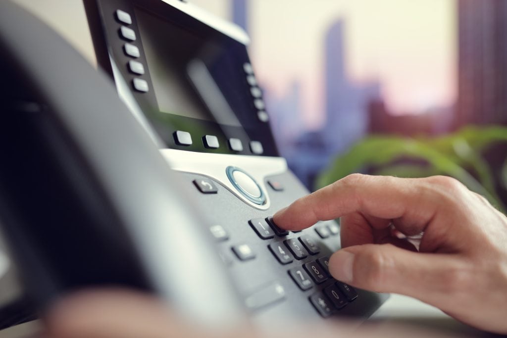 office phone hand dialing
