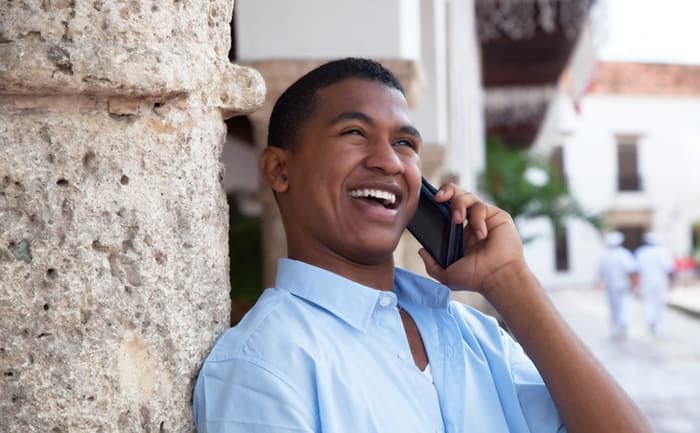 latin guy cellphone