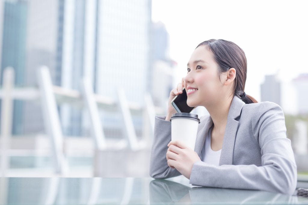 woman cellphone coffe