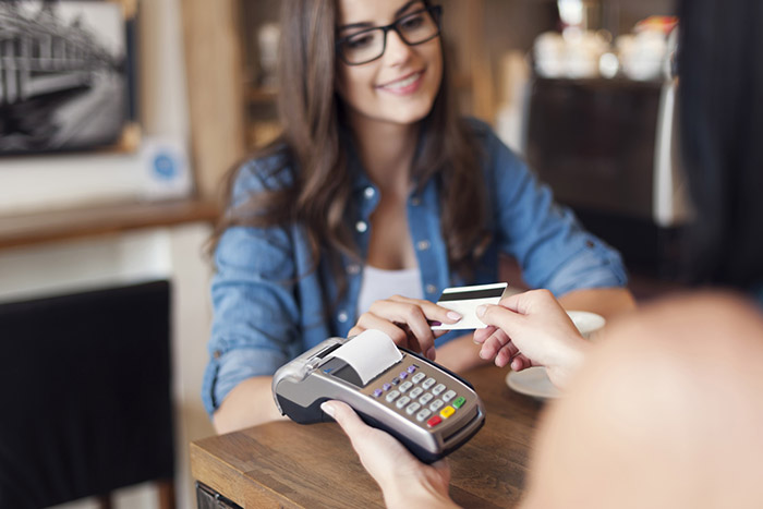 lady paying with credit card