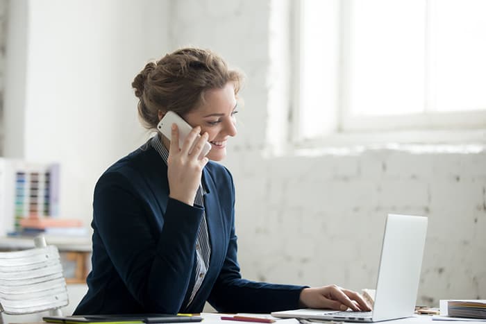 lady cellphone laptop