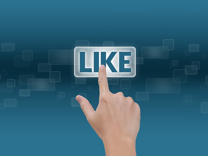 hand clicking like button