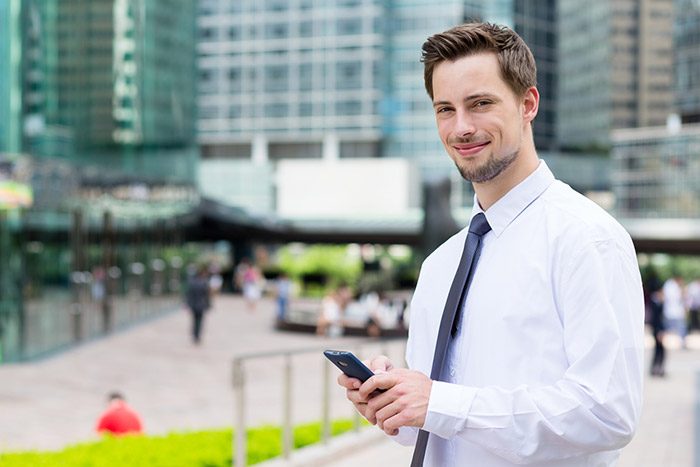 An image of a German man using call forwarding.