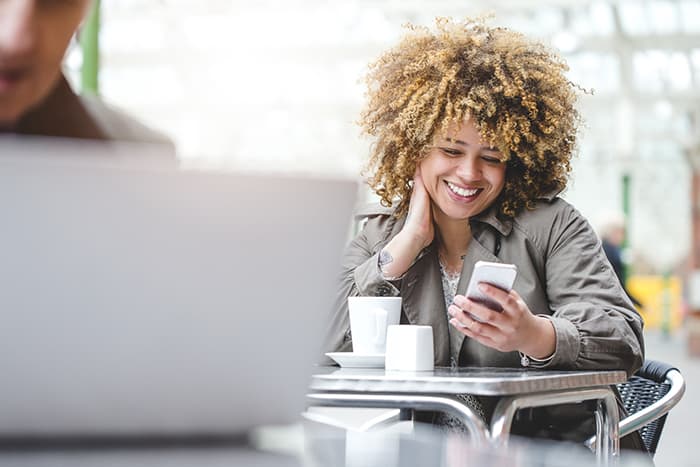 lady cellphone coffee