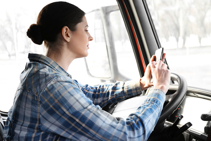 lady cellphone driving truck
