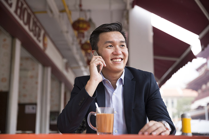 businessman cellphone coffee