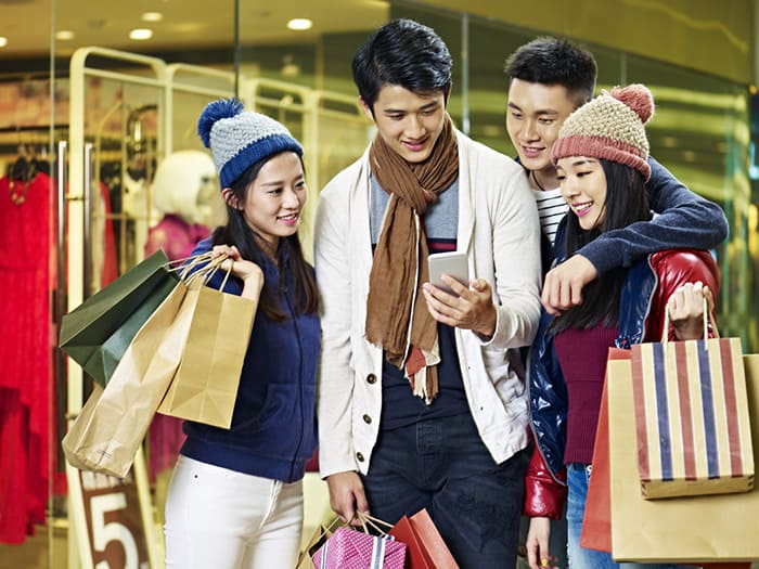 An image of people getting South Korea phone numbers.