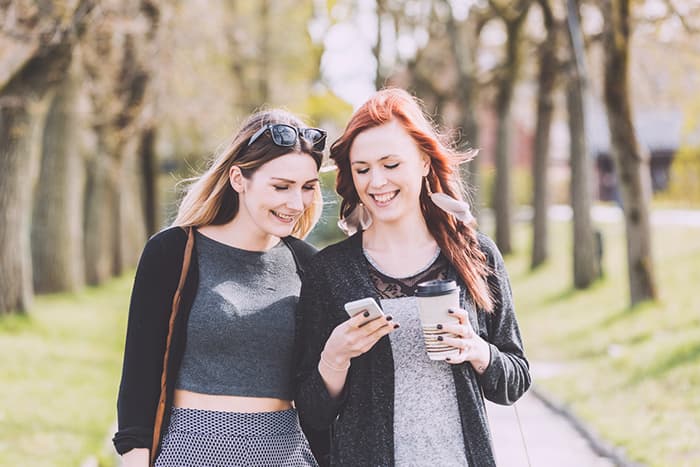 two ladies phone