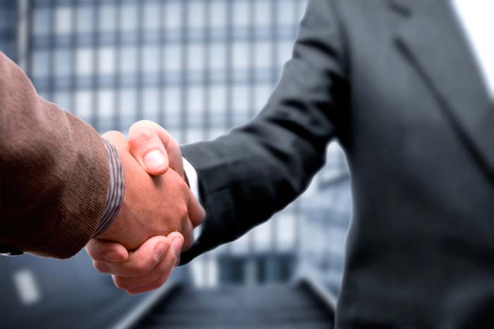 Business Men Shaking Hands Inspire Trust
