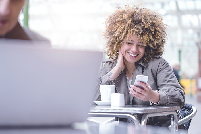 A photo of a woman keeping her landline phone number without service